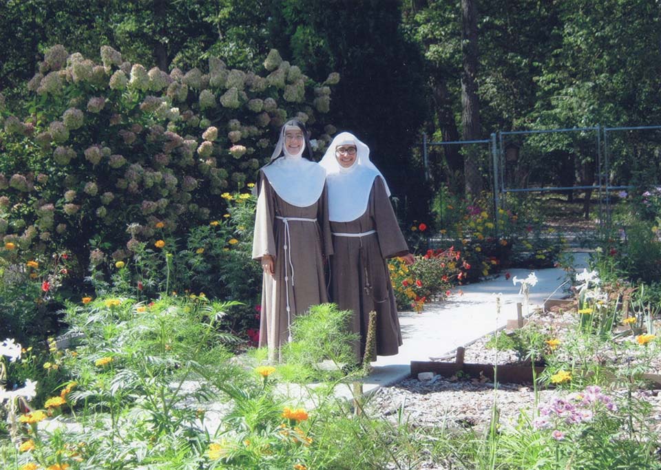 Two sisters in the garden.